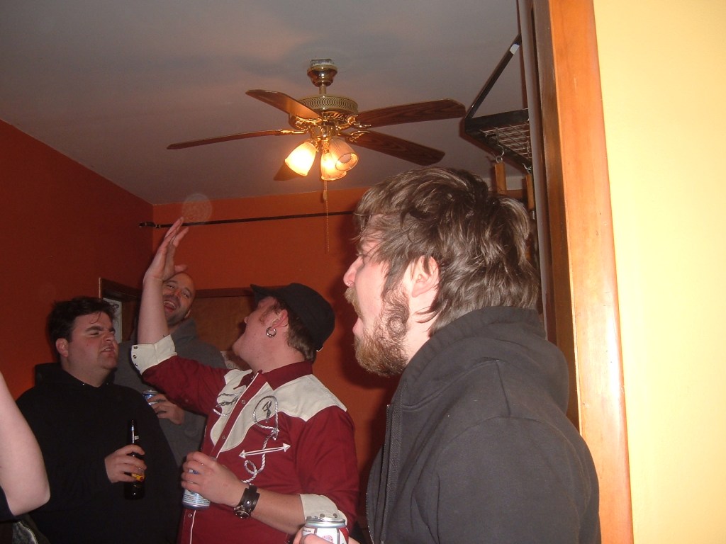 My going away party - everyone's singing "Don't Stop Believing." That year during the White Sox winning hubbub it became the traditional birthday song for our group, but this is the first time I can remember them singing it for me. Aaron's the one with his arm raised - he rules this song at karaoke night.