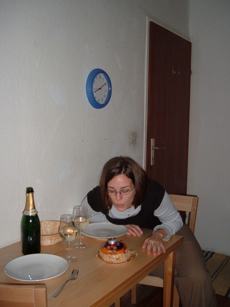 Blowing out my birthday candle in Vienna on my 23rd birthday, 2004. KT bought me this amazing birthday tart (and of course champagne - birthdays MUST have champagne).