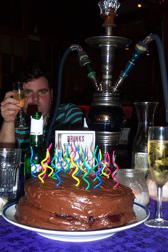 My birthday cake (and my friend Al) in 2005, during my evacuation to Chicago. It's a vegan mocha raspberry cake, baked by yours truly...and to this date, the most delicious thing I've ever baked.